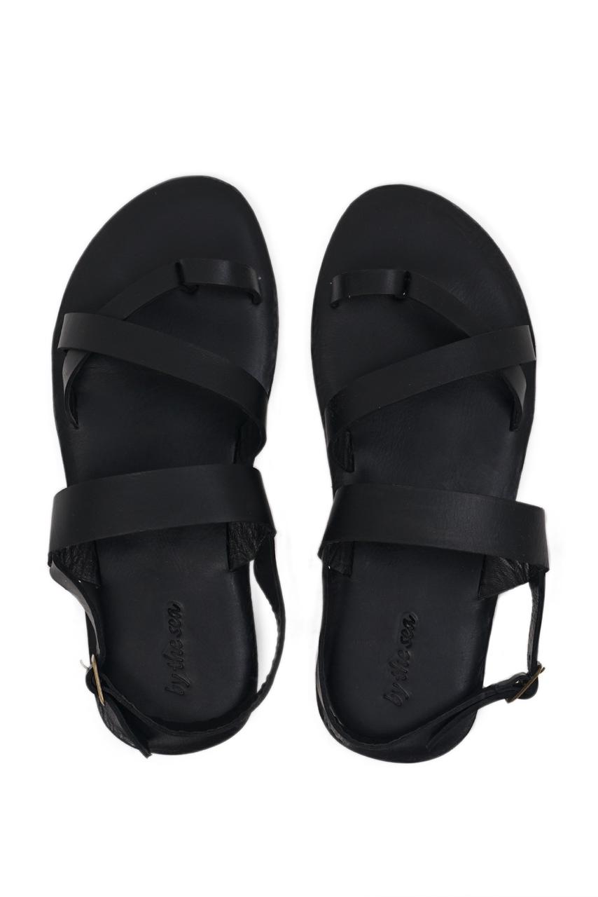 Arus sandal shown in a global view highlighting its full silhouette and refined resort-ready design