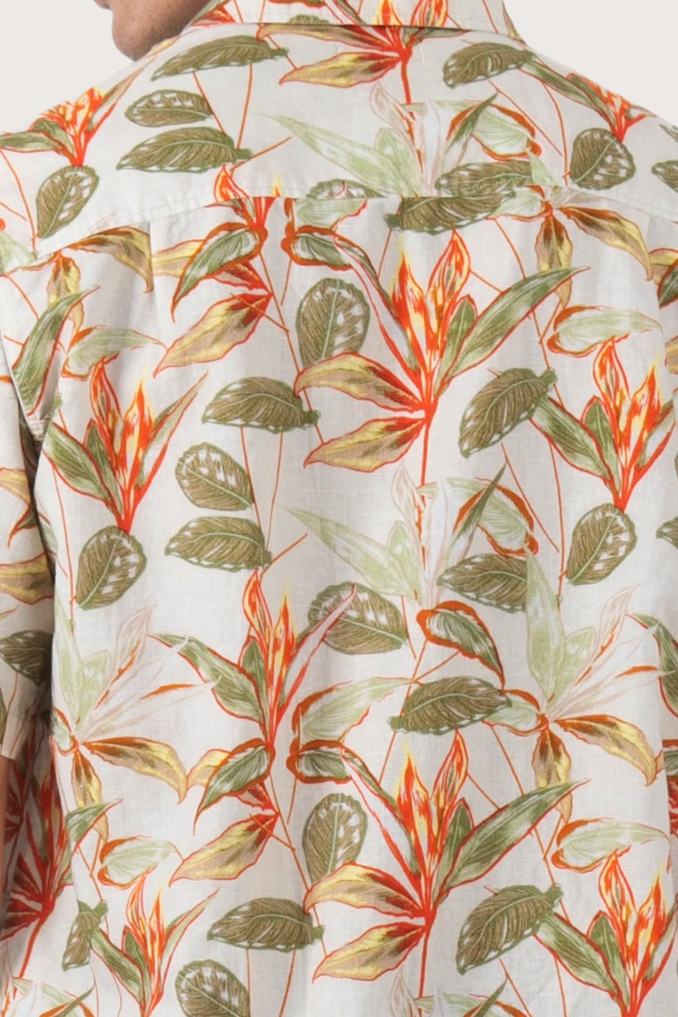 Open collar and button-front detail of the Asa Loose Fit Shirt Begonia in Green by By The Sea Bali