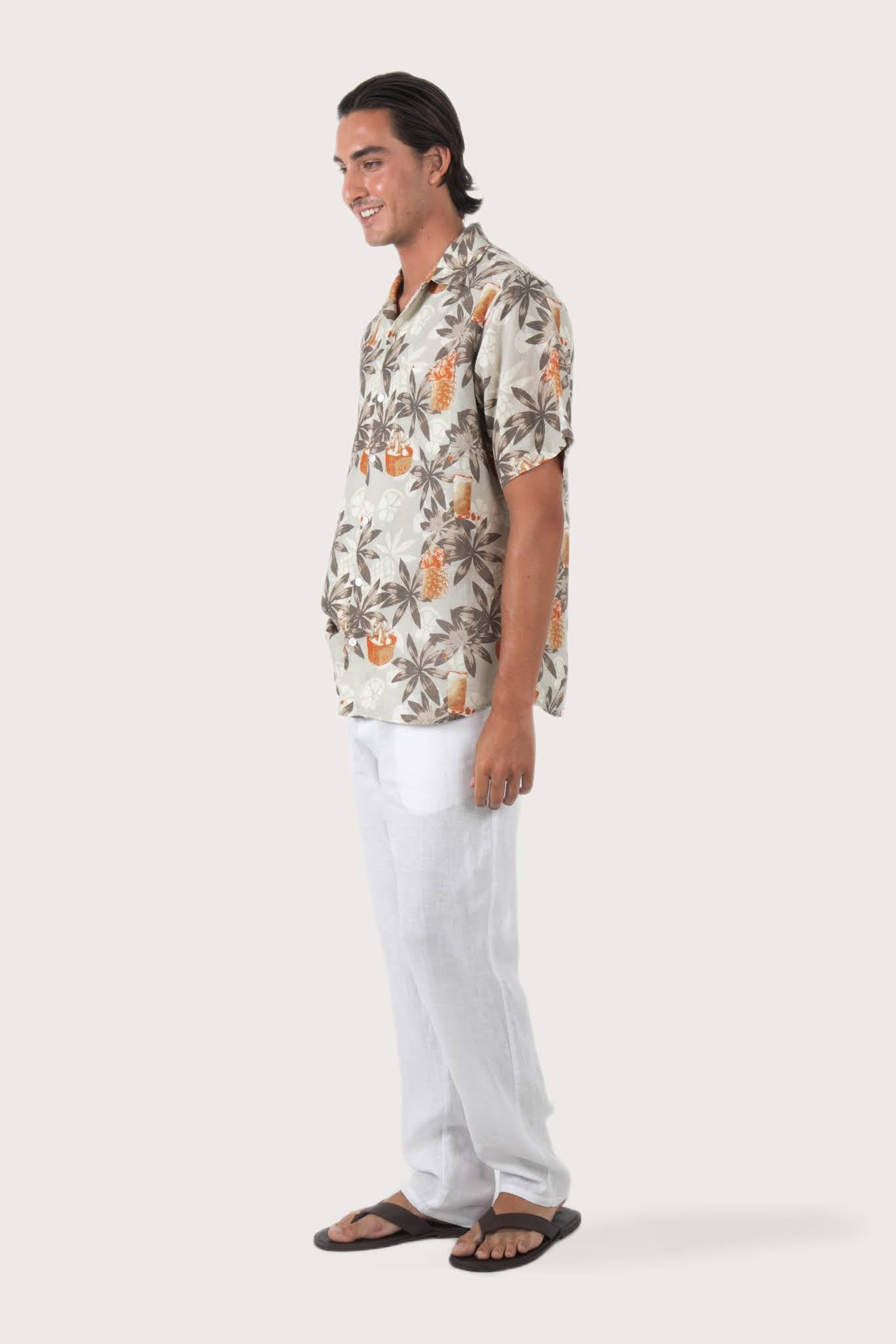 Side-angle view of the Asa Loose Fit Shirt Rustic Pineapple in Grey showing its relaxed drape by By The Sea Bali