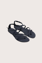 Astola sandal in navy front view showcasing elegant straps and minimalist resort aesthetic