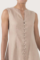Close up detail of the Ayu Linen Maxi Dress Nude highlighting craftsmanship and design features