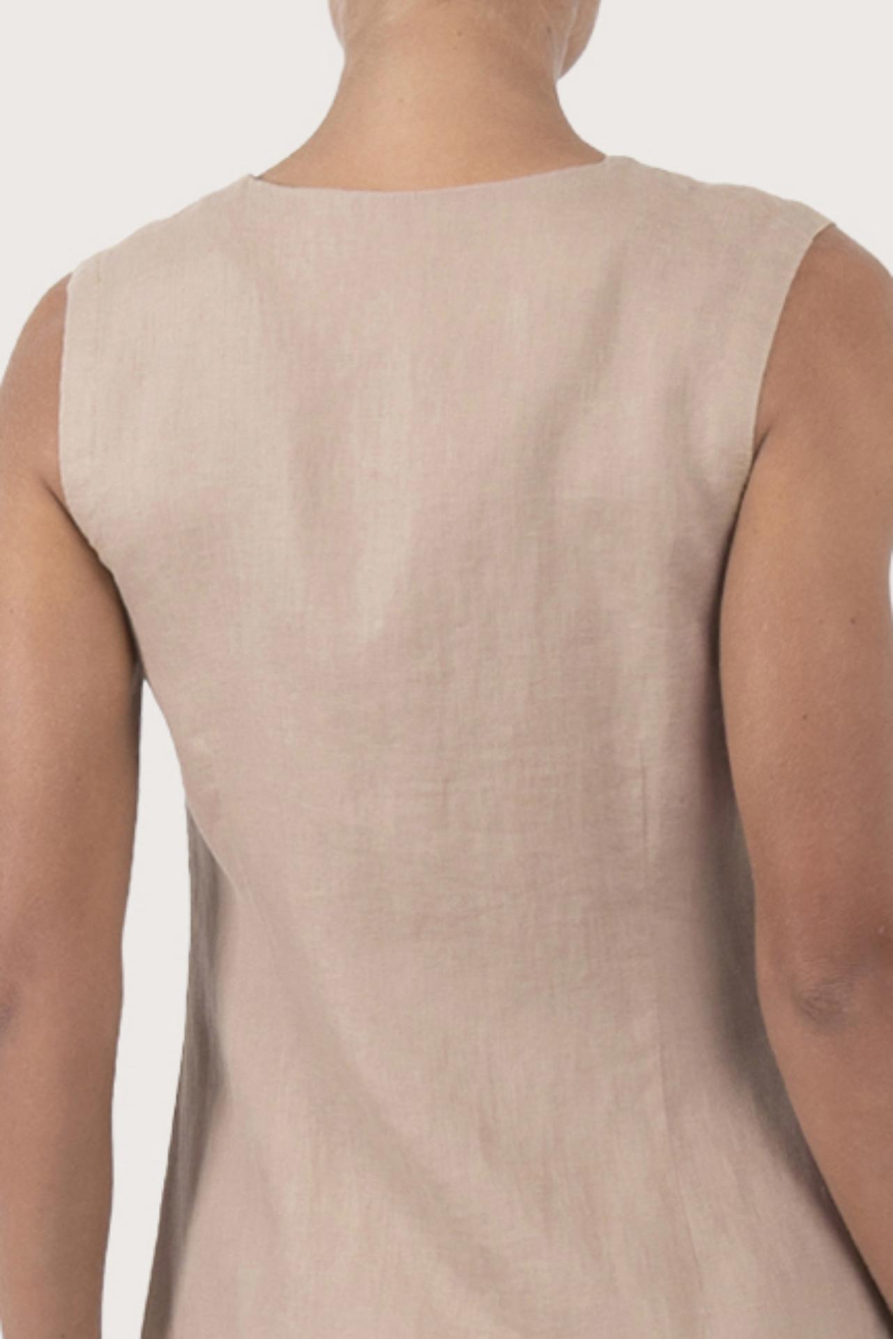 Close up detail of the Ayu Linen Maxi Dress Nude highlighting craftsmanship and design features