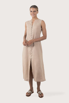 Woman wearing the Ayu Linen Maxi Dress Nude designed for effortless resortwear and tropical living by By The Sea Bali