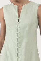Close up detail of the Ayu Linen Maxi Dress Pastel Green highlighting craftsmanship and design features