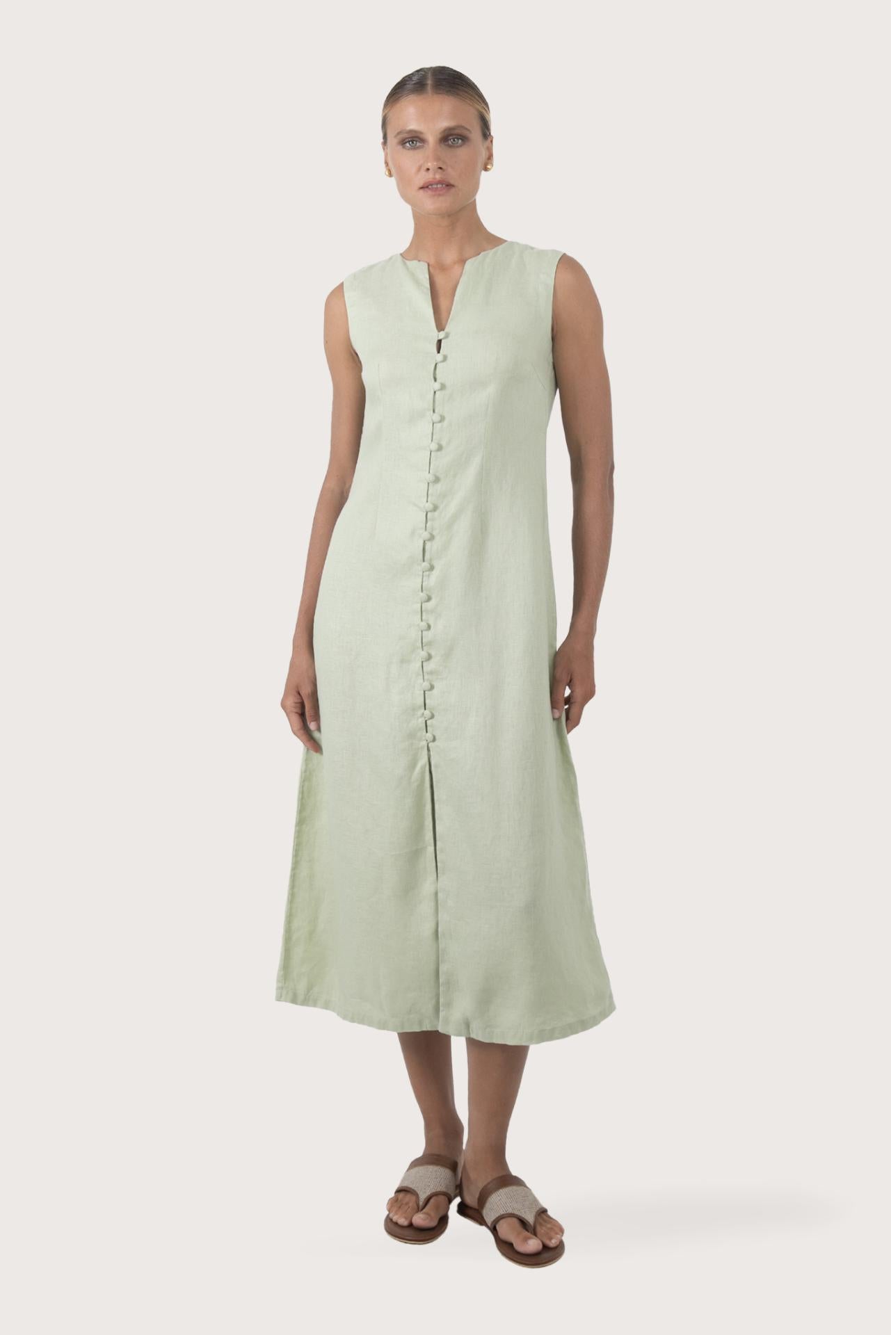 Woman wearing the Ayu Linen Maxi Dress Pastel Green designed for effortless resortwear and tropical living by By The Sea Bali