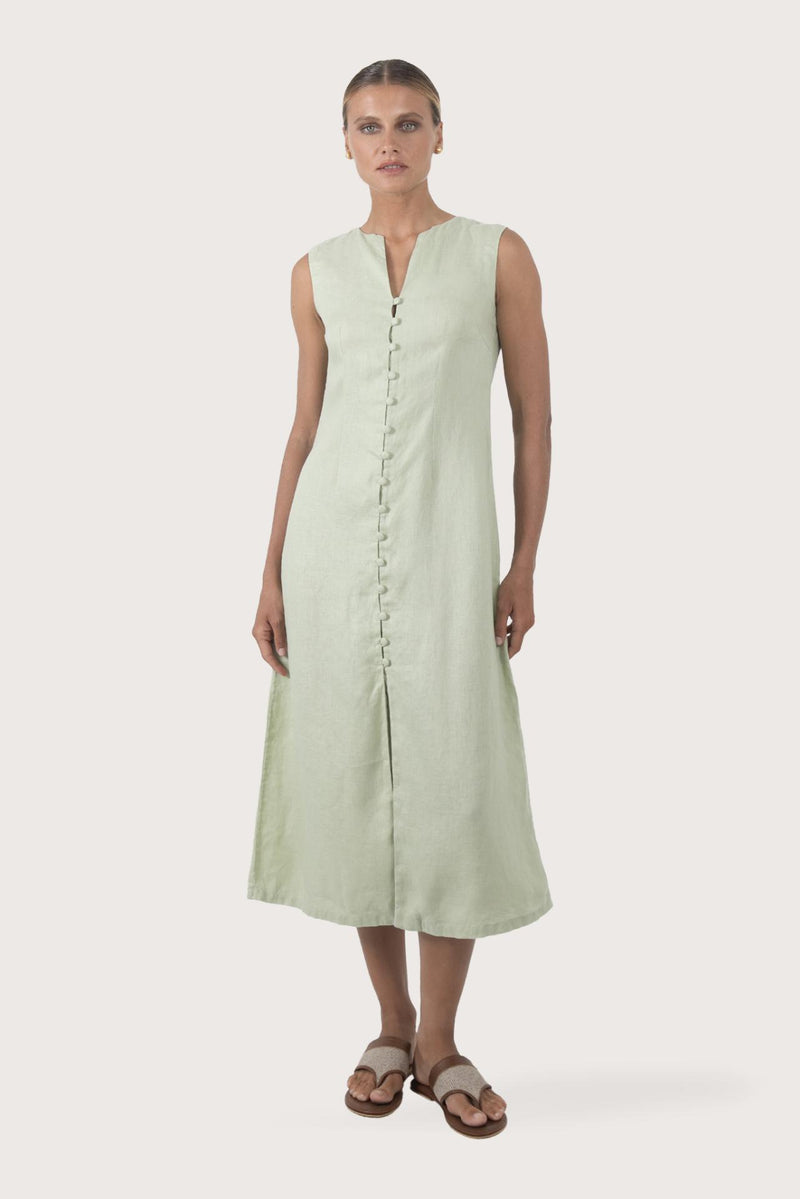 Woman wearing the Ayu Linen Maxi Dress Pastel Green designed for effortless resortwear and tropical living by By The Sea Bali