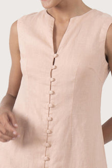 Close up detail of the Ayu Linen Maxi Dress Pastel Pink highlighting craftsmanship and design features