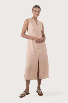 Woman wearing the Ayu Linen Maxi Dress Pastel Pink designed for effortless resortwear and tropical living by By The Sea Bali