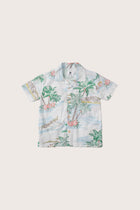 Model wearing the white Tropical Day Bali Tropical shirt by By The Sea Bali
