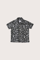 Coastal-inspired look featuring the Bali Tropical Shirt in a playful tropical print