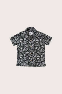 Coastal-inspired look featuring the Bali Tropical Shirt in a playful tropical print