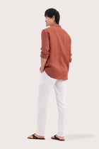 Back view of the Baron Linen Shirt Brick showcasing its tailored finish by By The Sea Bali