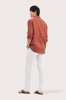 Back view of the Baron Linen Shirt Brick showcasing its tailored finish by By The Sea Bali