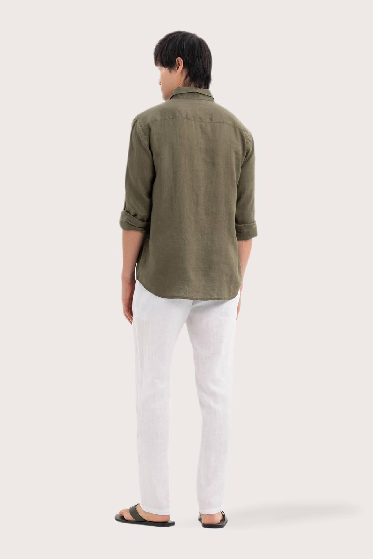 Back view of the Baron Linen Shirt Green showcasing its tailored finish by By The Sea Bali