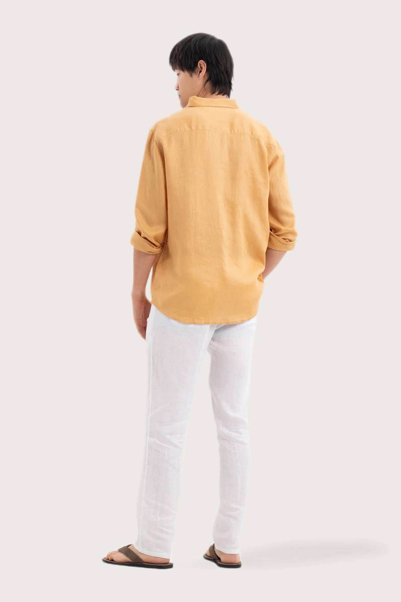 Back view of the Baron Linen Shirt Yellow showcasing its tailored finish by By The Sea Bali
