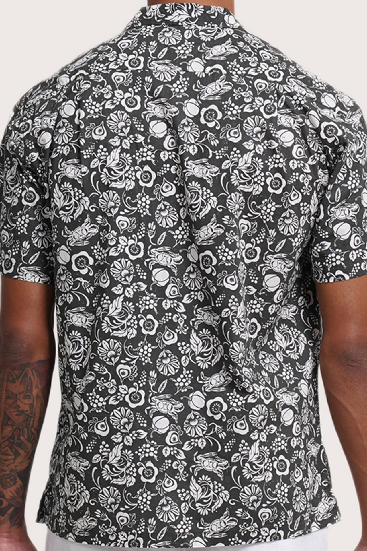 Open collar and button-front detail of the Baronang Cotton Shirt Veg and Crab in Grey by By The Sea Bali