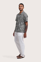 Side profile of the Baronang Cotton Shirt Veg and Crab in Grey highlighting its easy, breathable fit by By The Sea Bali