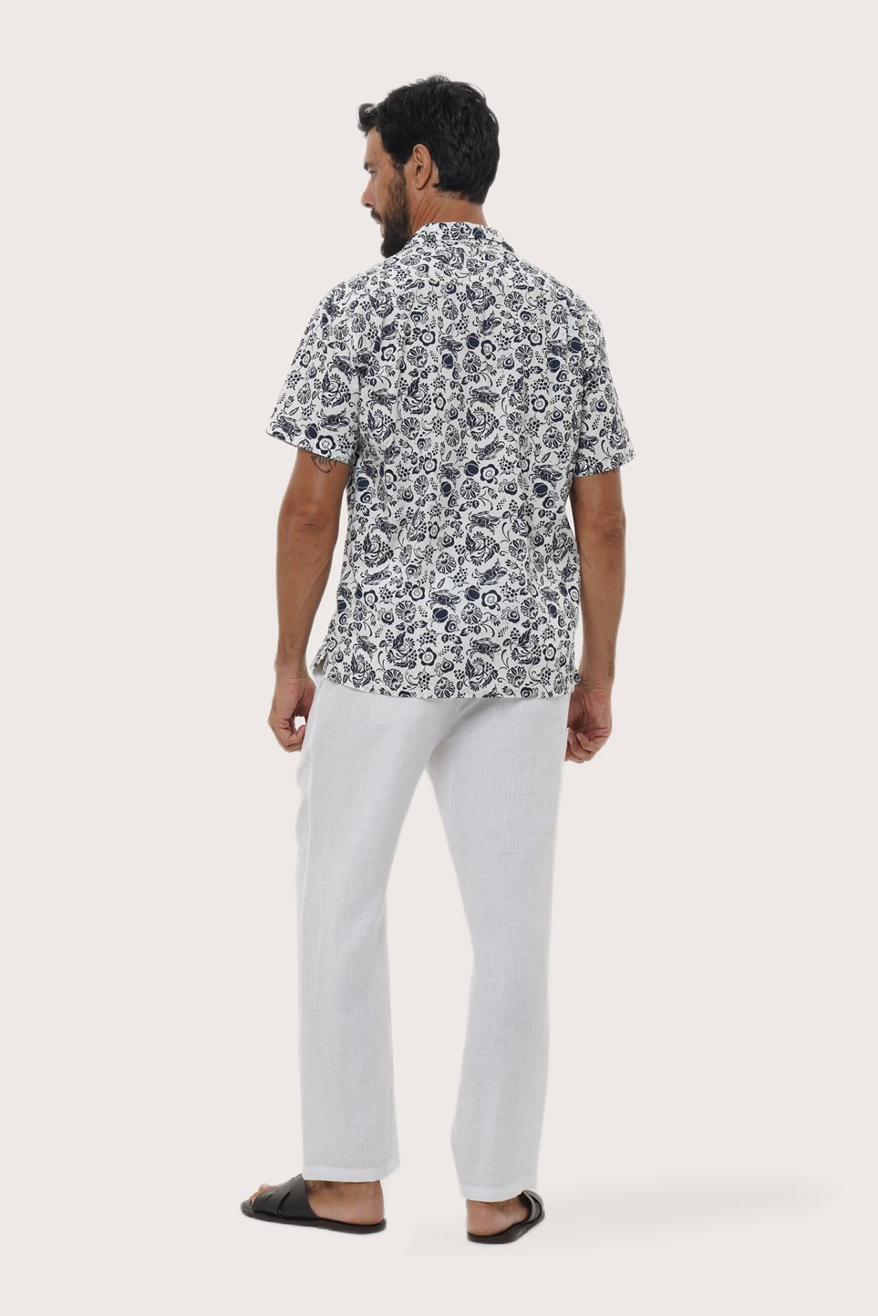Side profile of the Baronang Cotton Shirt in Veg and Crab White showing its relaxed fit by By The Sea Bali