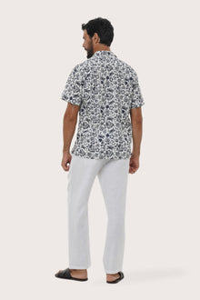 Side profile of the Baronang Cotton Shirt in Veg and Crab White showing its relaxed fit by By The Sea Bali