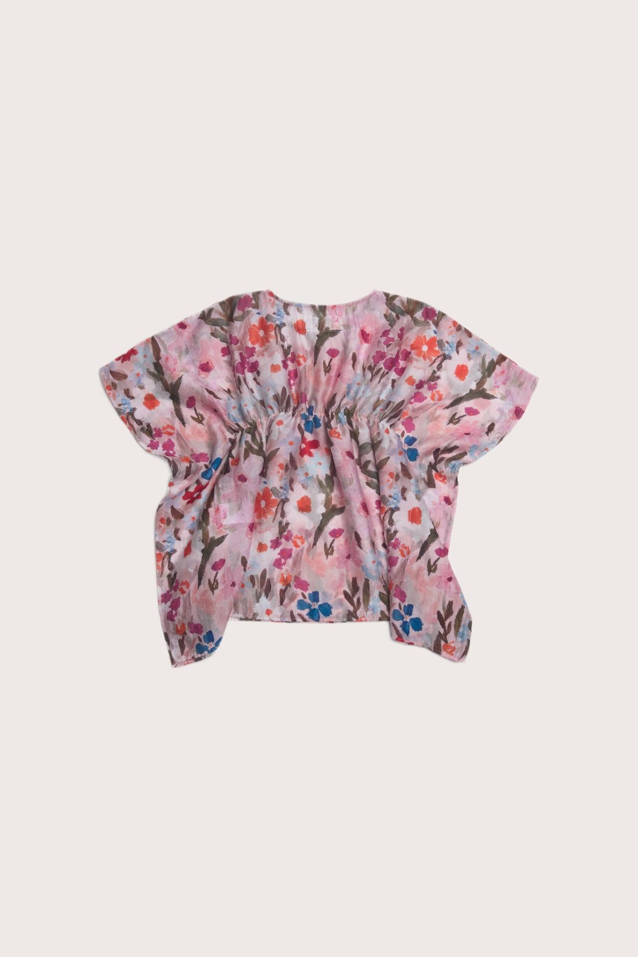 Graceful back view of the Belle Kaftan in Flower Paint Light Pink