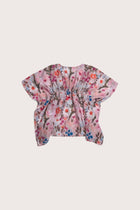 Graceful back view of the Belle Kaftan in Flower Paint Light Pink