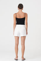 Back view of the Besca Linen Short Off White highlighting the garment shape and drape