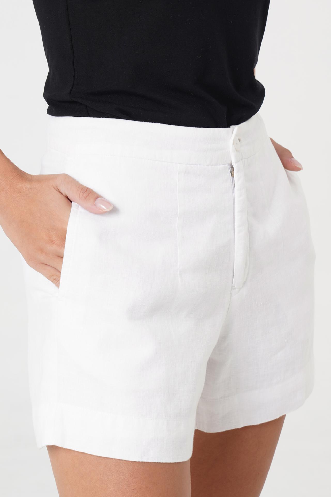 Close up detail of the Besca Linen Short Off White highlighting craftsmanship and design features