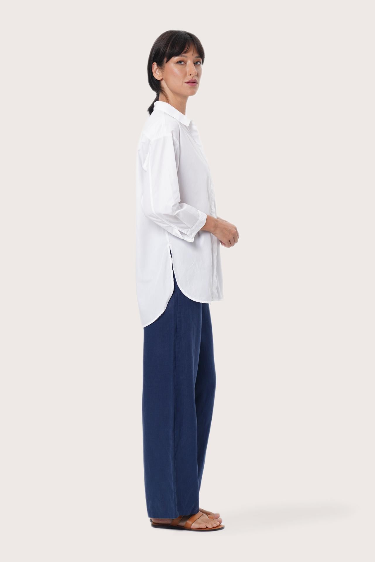 By The Sea Bali Side profile of the Bey Loose Shirt showcasing its relaxed fit and fluid drape