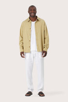 Model wearing the light yellow Birco jacket by By The Sea Bali