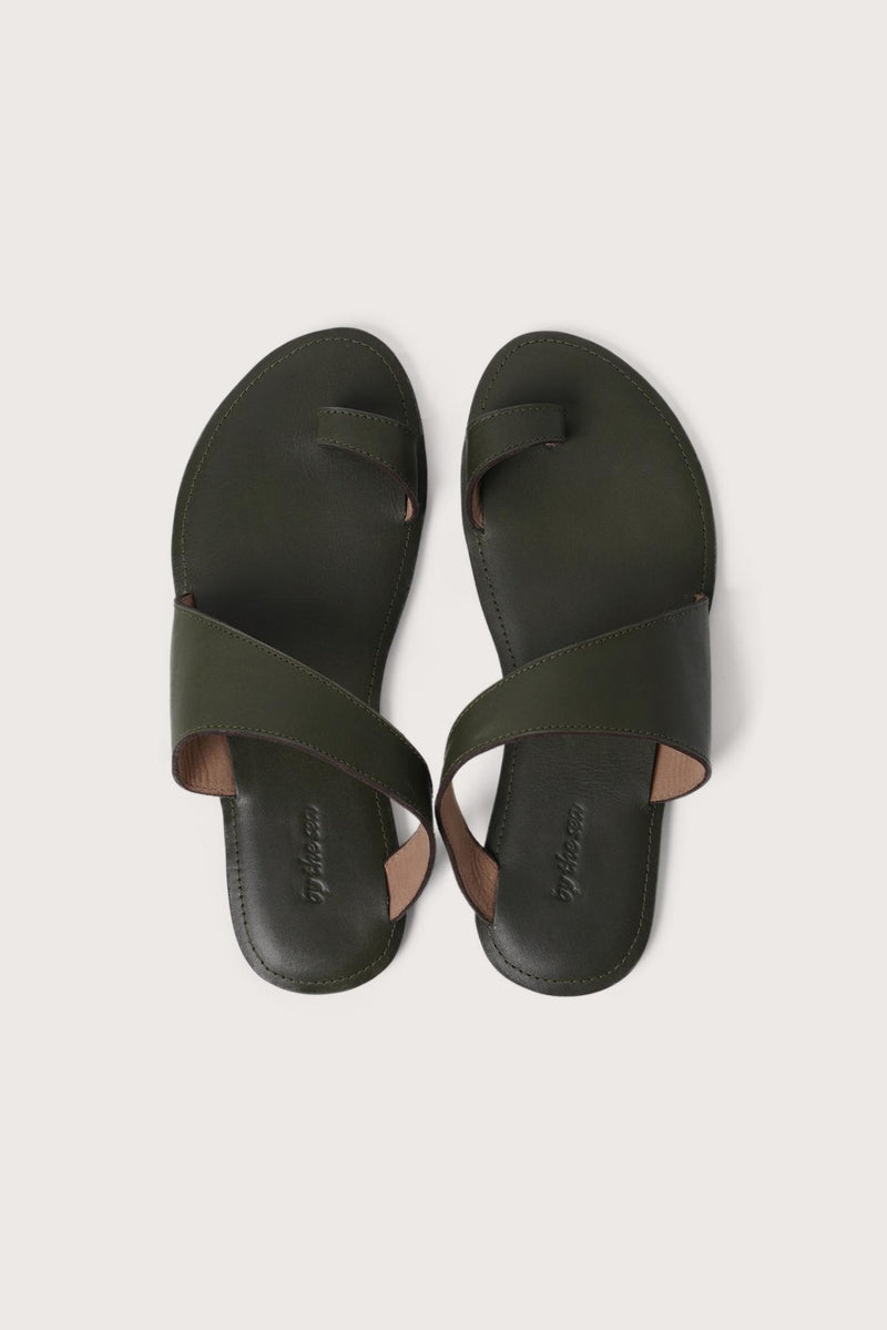 Bitsy sandal in green shown in a global view highlighting its full silhouette and resort-ready design