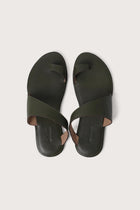 Bitsy sandal in green shown in a global view highlighting its full silhouette and resort-ready design