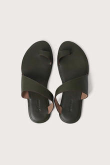 Bitsy sandal in green shown in a global view highlighting its full silhouette and resort-ready design