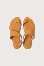 Bitsy sandal in yellow shown in a global view highlighting its full silhouette and resort-ready design
