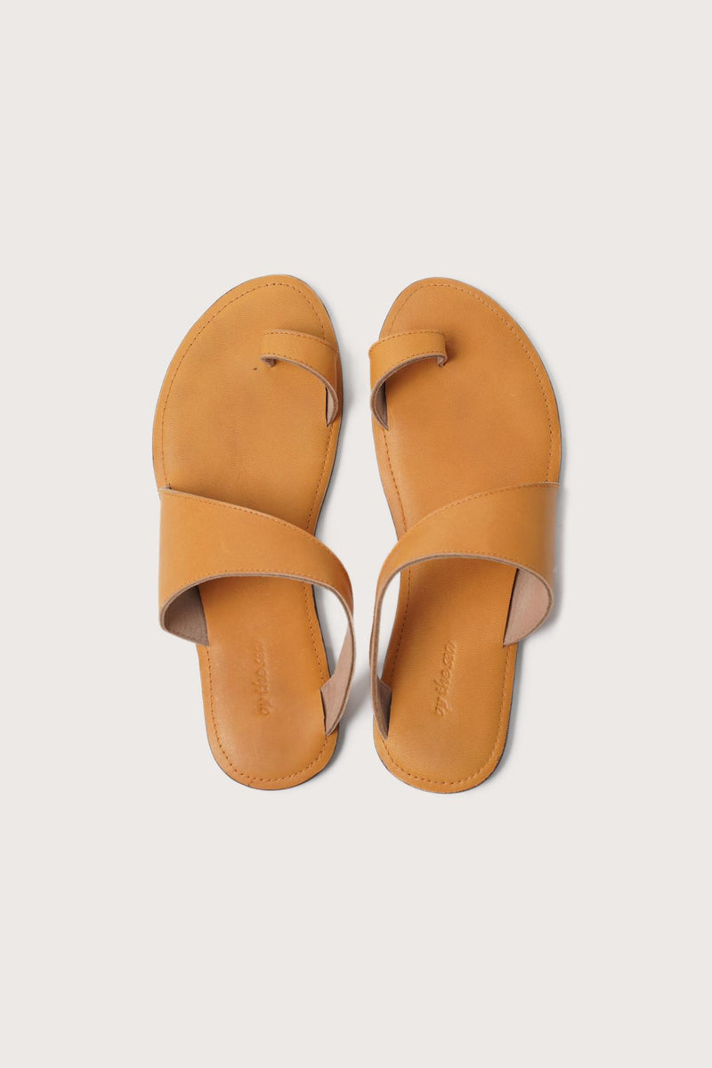 Bitsy sandal in yellow shown in a global view highlighting its full silhouette and resort-ready design
