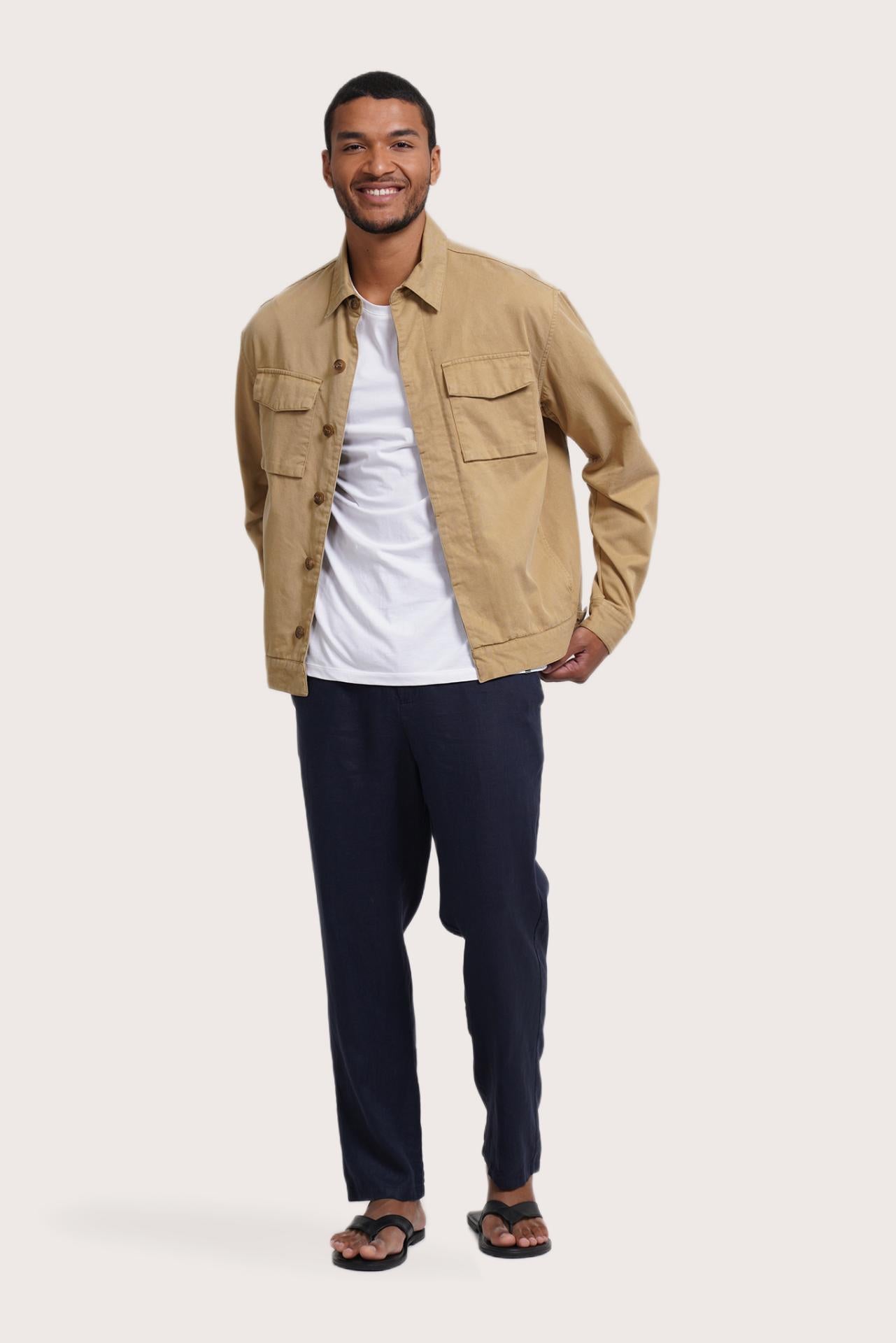 Model wearing the light beige Broo jacket by By The Sea Bali