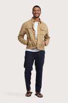 Model wearing the light beige Broo jacket by By The Sea Bali