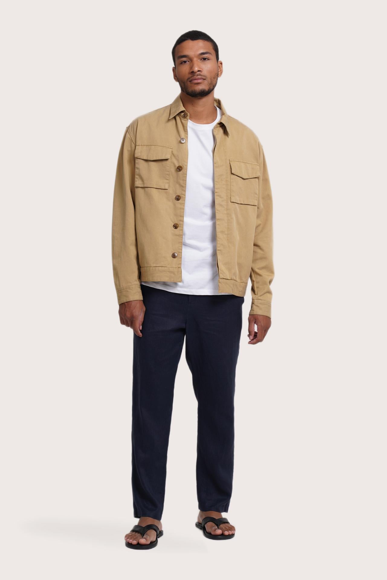Model wearing the light beige Broo jacket by By The Sea Bali