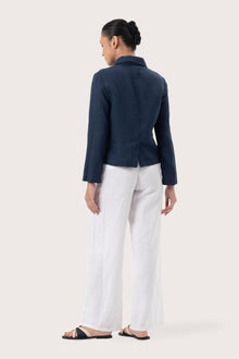 Back view of the Cala Linen Blazer Navy highlighting the garment shape and drape