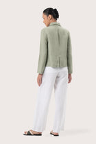 Back view of the Cala Linen Blazer Sage highlighting the garment shape and drape