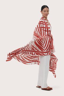 Graceful side profile of the Calinda Sarong in Spring Palm print