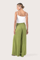 Back view of the Callie Palazzo Pants Green highlighting the garment shape and drape.