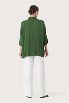 Back view of the Candidasa Shirt Green highlighting the garment shape and drape.