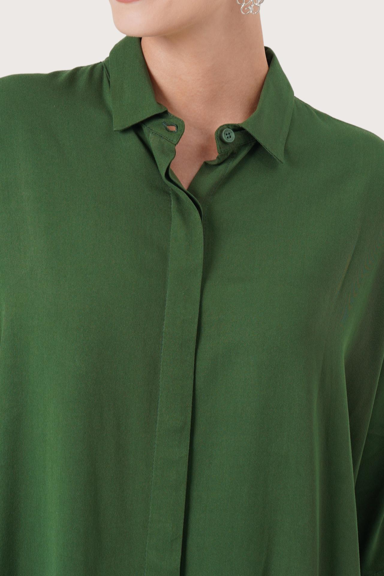 Close up detail of the Candidasa Shirt Green highlighting craftsmanship and design features.