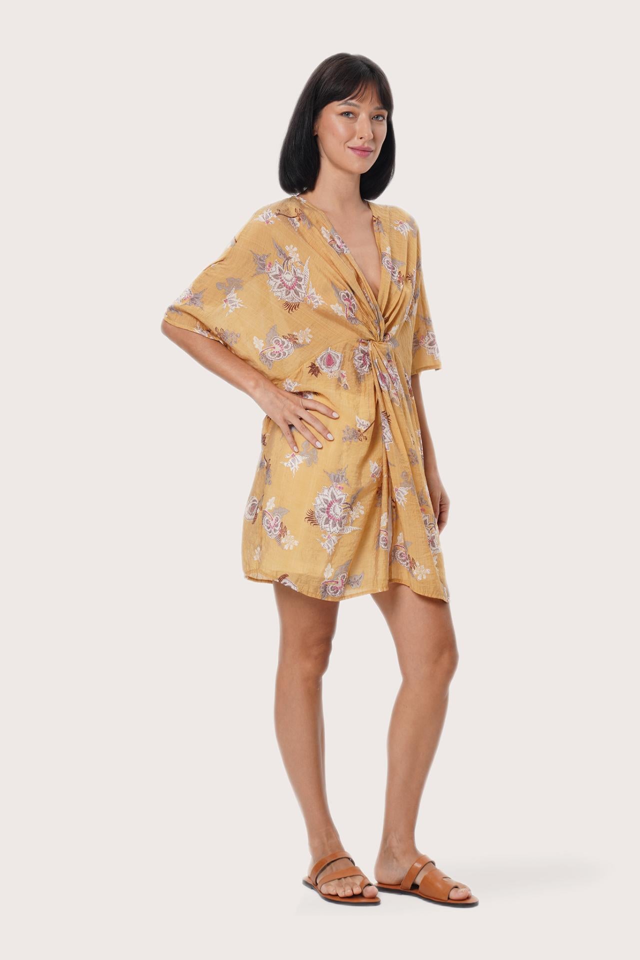 Elegant back view of the Canna Short Kaftan in Calendula Camel print