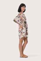 Airy short kaftan silhouette in soft Oleander Creme botanical tones