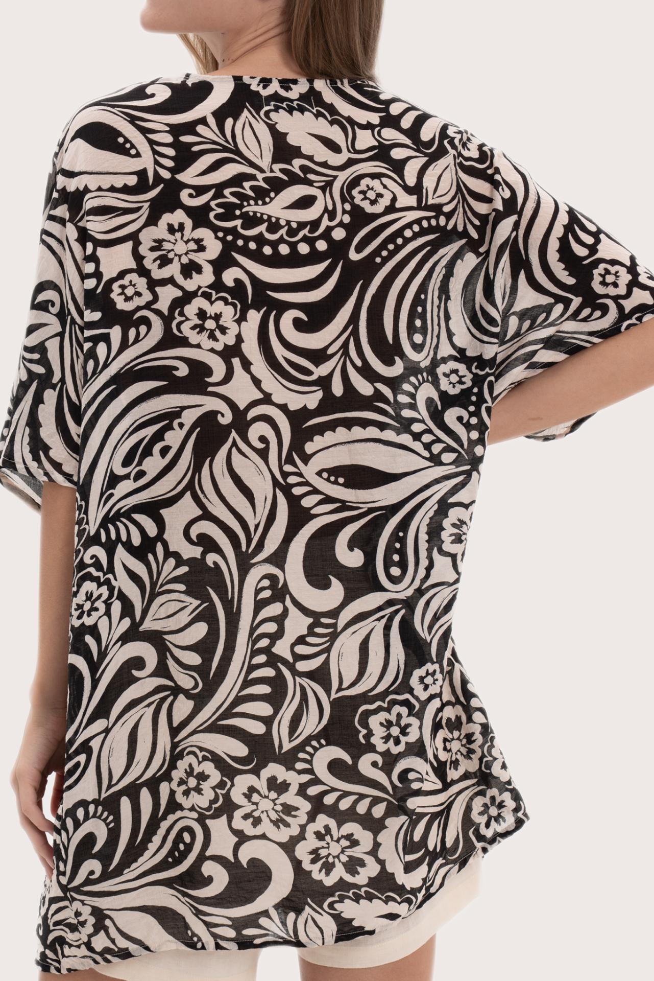Detailed back view highlighting the paisley print and relaxed fit of the short kaftan