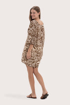 Back view of the brown paisley short kaftan with a relaxed flowing silhouette