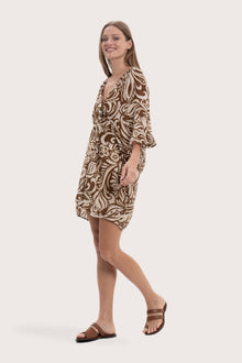 Side profile of the brown paisley short kaftan showcasing its lightweight drape