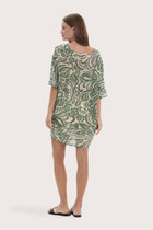 Back view of the green paisley short kaftan with a relaxed flowing silhouette