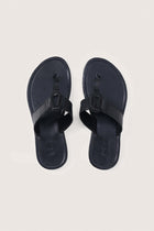 Black leather Cate sandals by By The Sea Bali displayed from the front